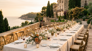 Luxury wedding in Spain cost &mdash; intimate estate reception table at golden hour